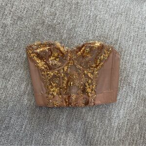 Victoria’s Secret very sexy gold sequin unlined corset top 36B.